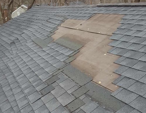 Does Homeowners Insurance Cover Shingles Blown Off Roof?