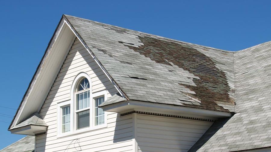 Does Homeowners Insurance Cover Shingles Blown Off Roof?